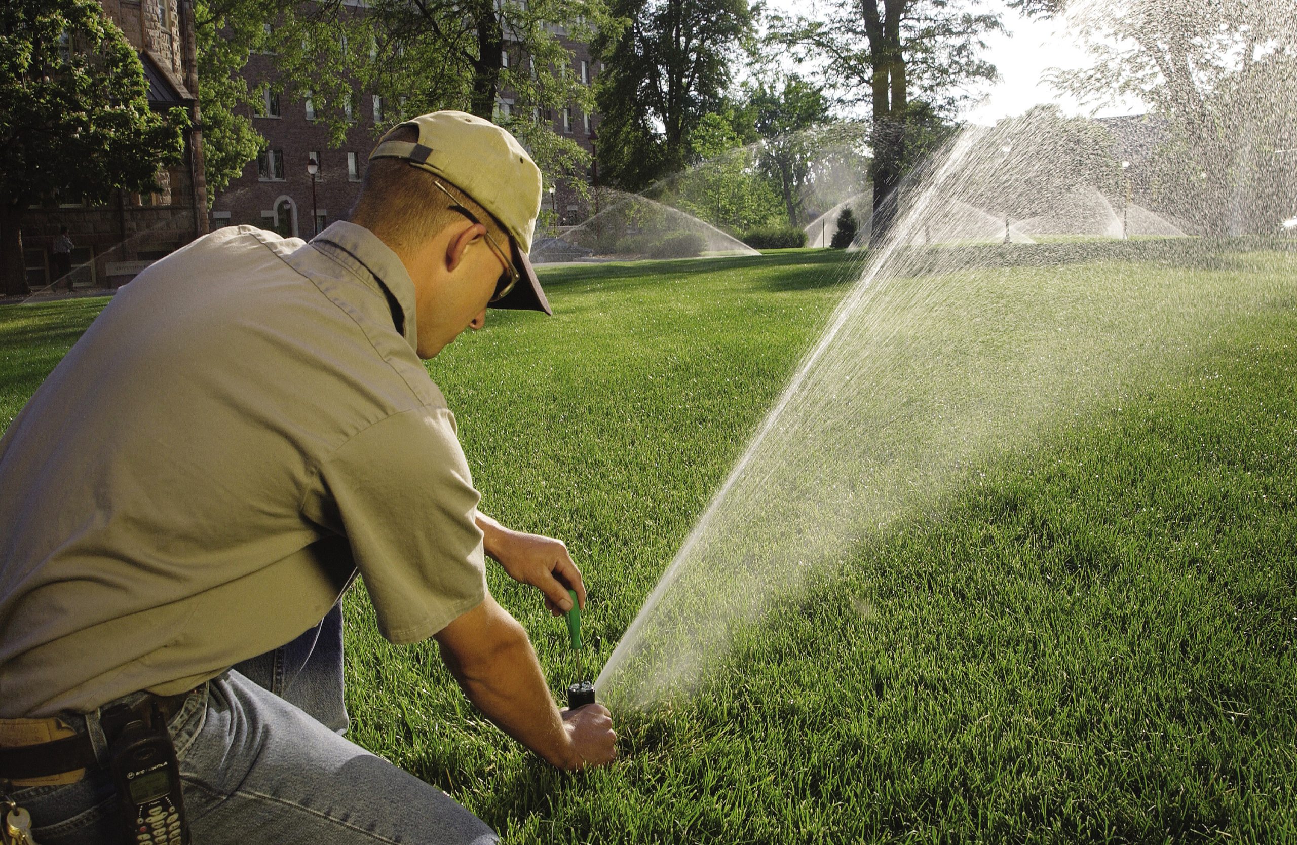 Sprinkler System Watering the grass