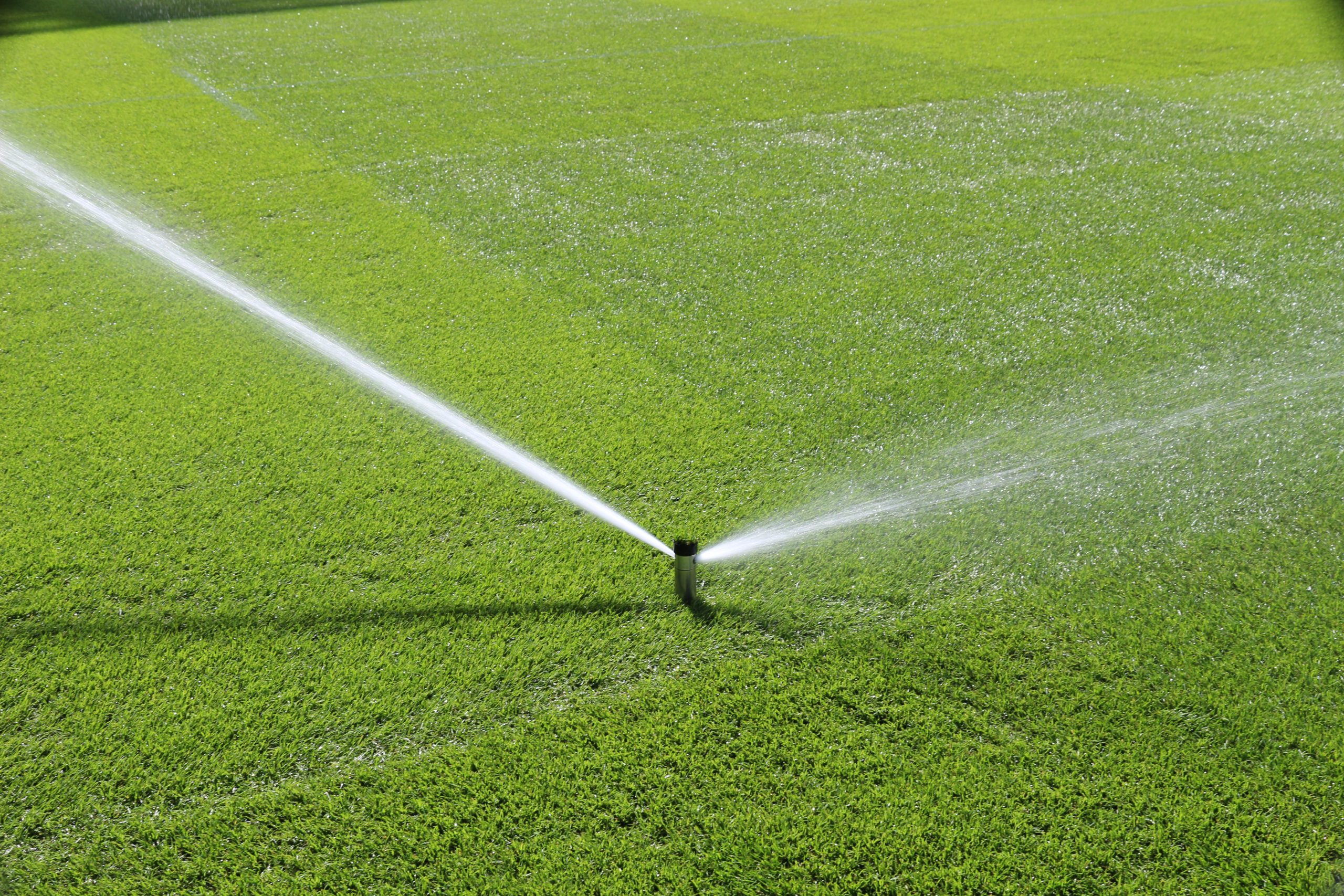 Sprinkler System Watering the grass