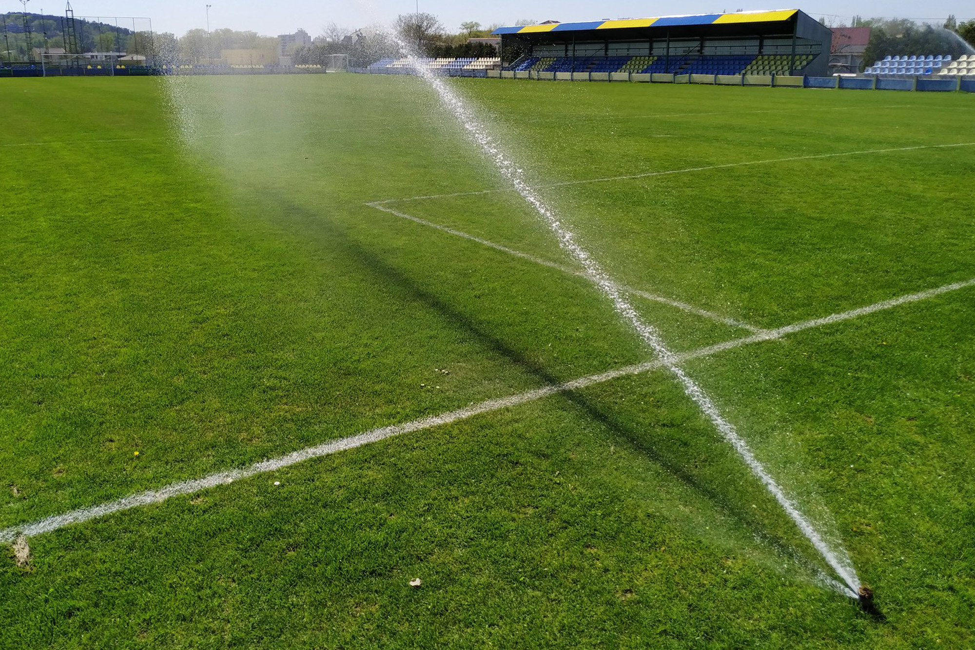 image of a sprinkler on a sports field